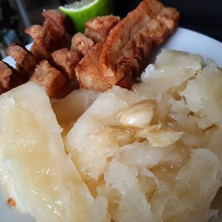 Boiled Yuca with Garlic Citrus Mojo & Pork Cracklings